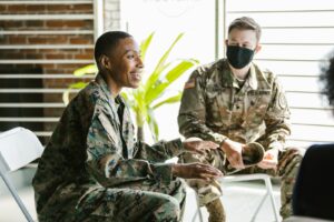 Photo of Soldiers Sitting on Folding Chairs, navy